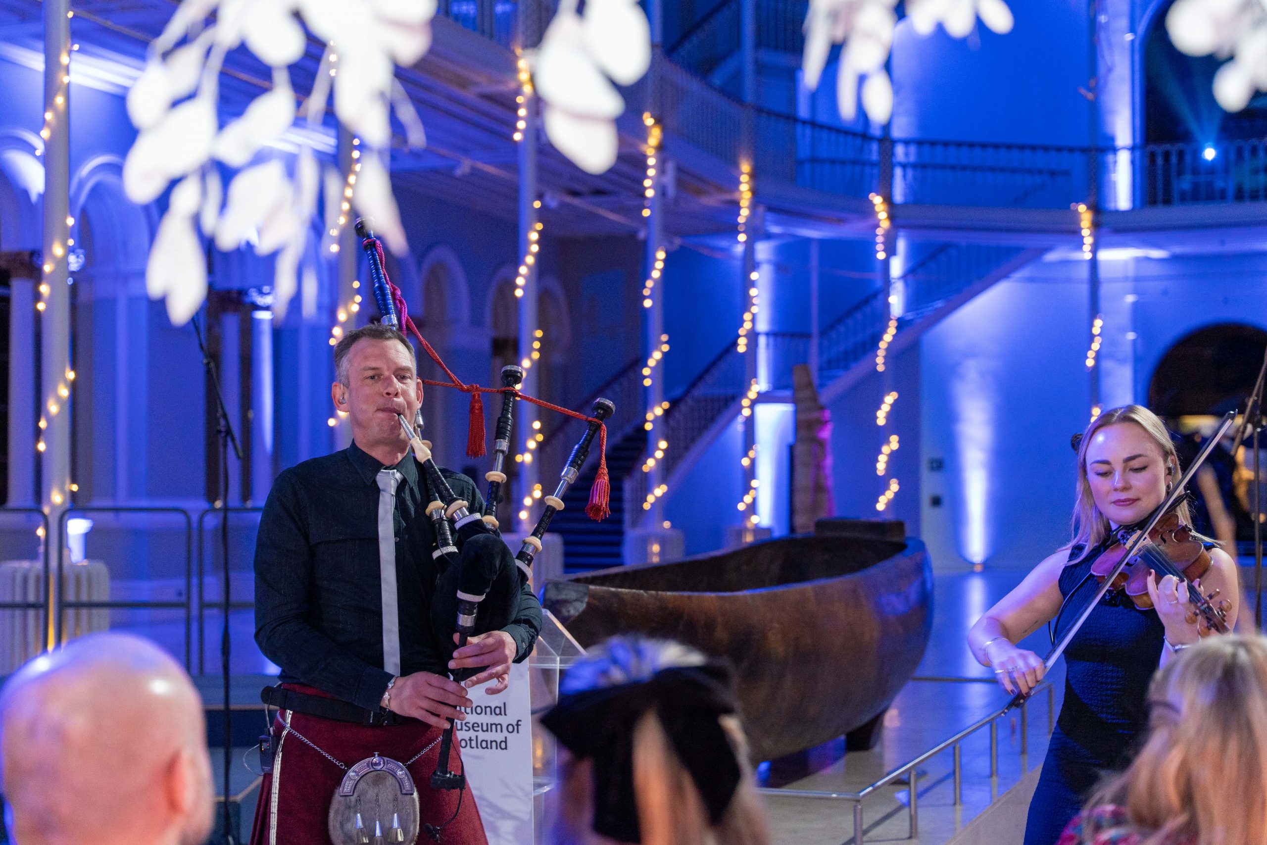 PipeDown bagpiper and fiddle player at event at national museum of Scotland
