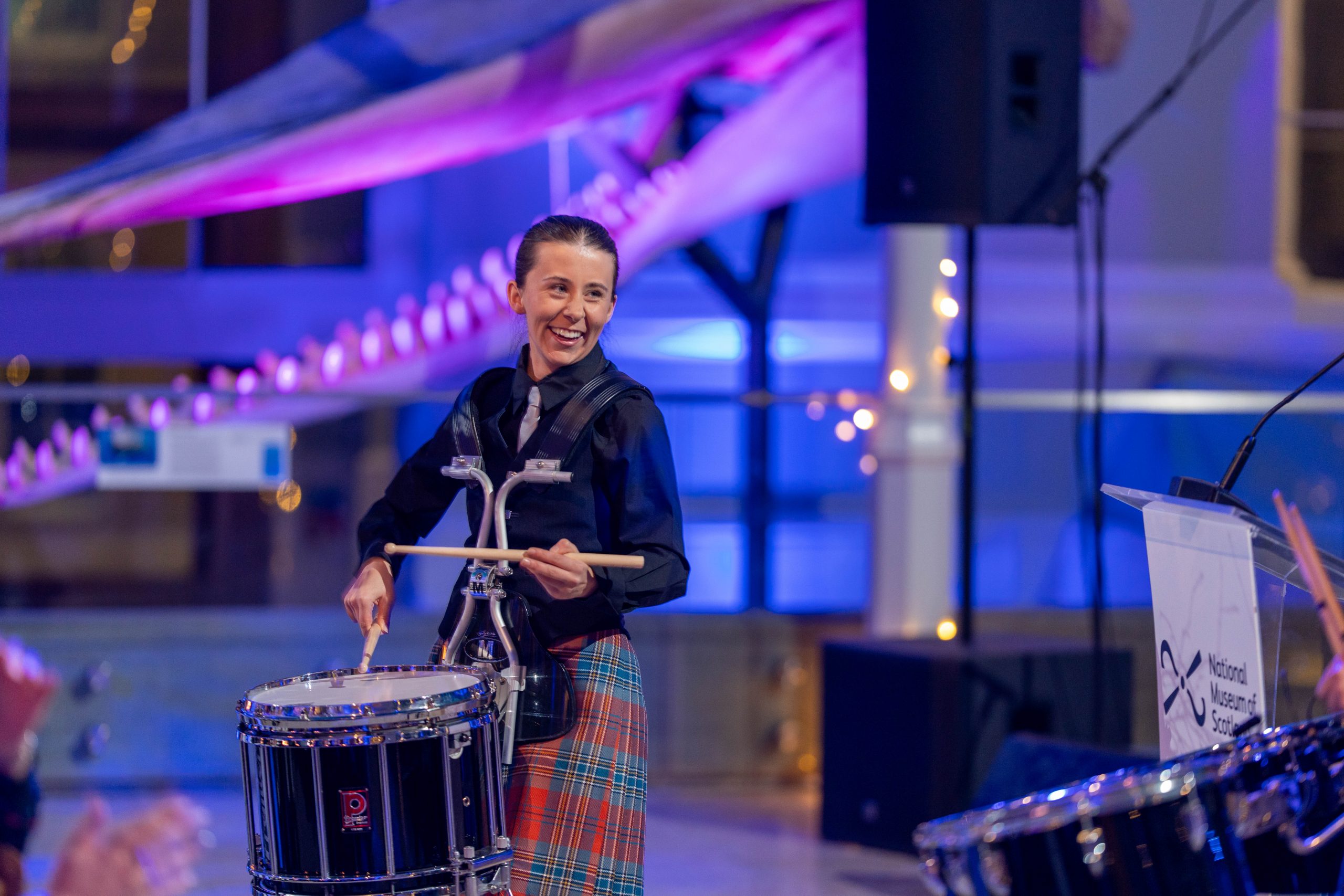 Pipedown drummer smiling at her excellent tunes